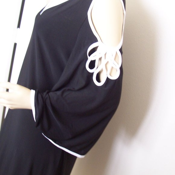 IVY ROAD Dresses & Skirts - AWESOME BLACK WITH WHITE MOTIF DRESS!